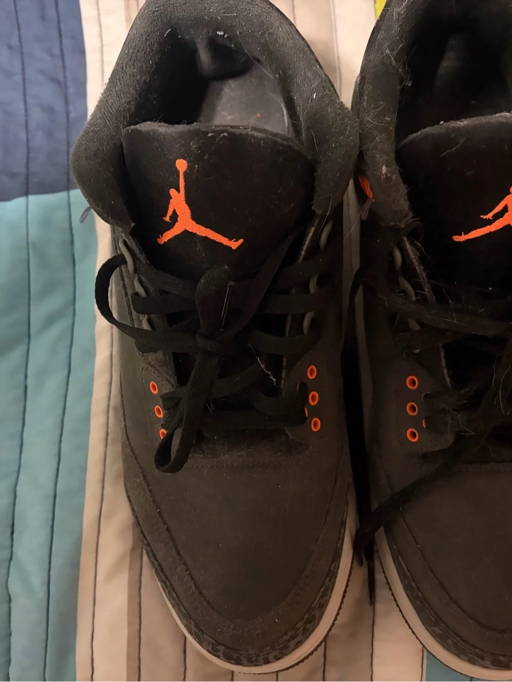 Jordan 3 Black Sneakers with Orange Jumpman Accents